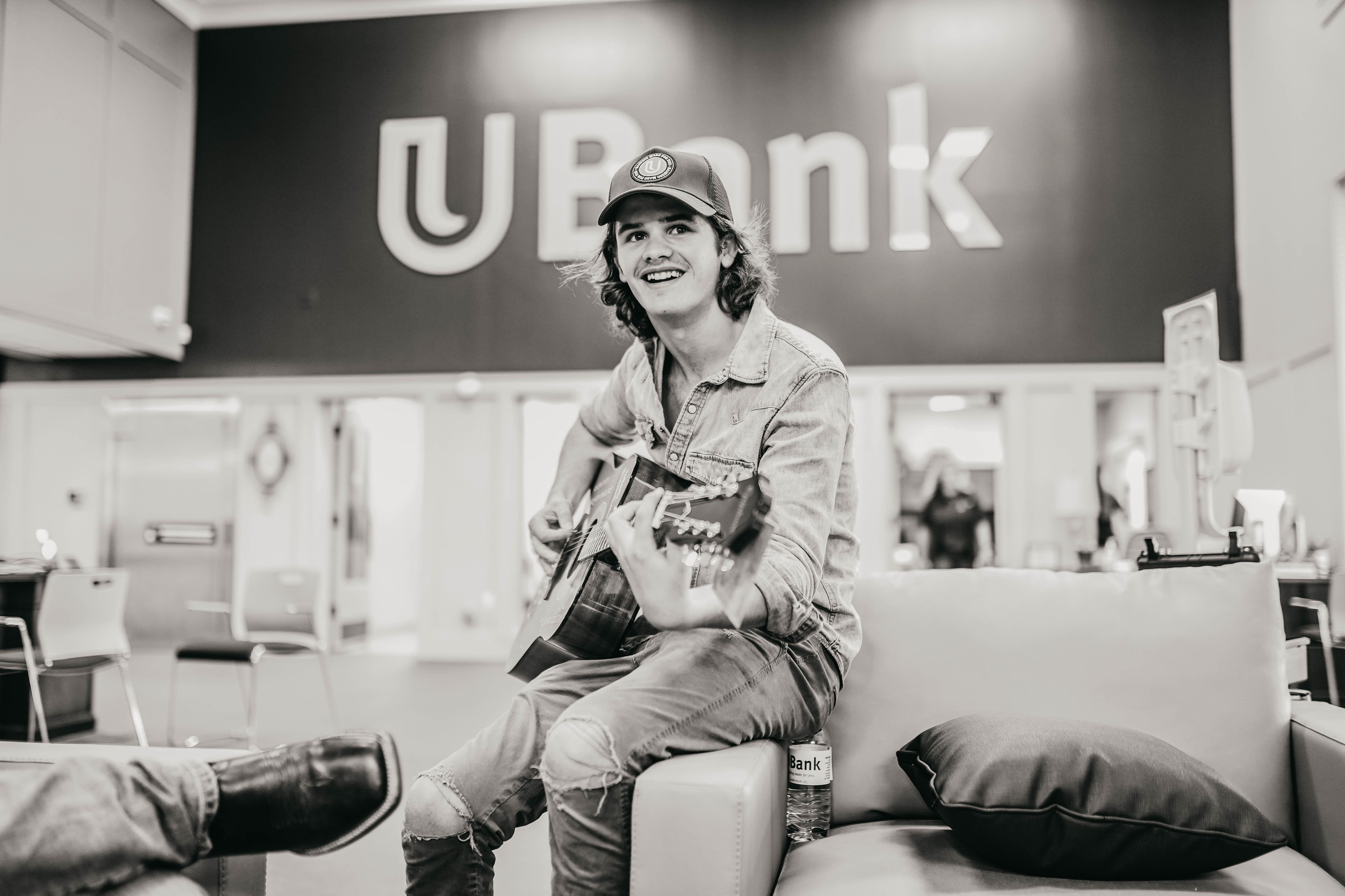 guitar player in UBank lobby